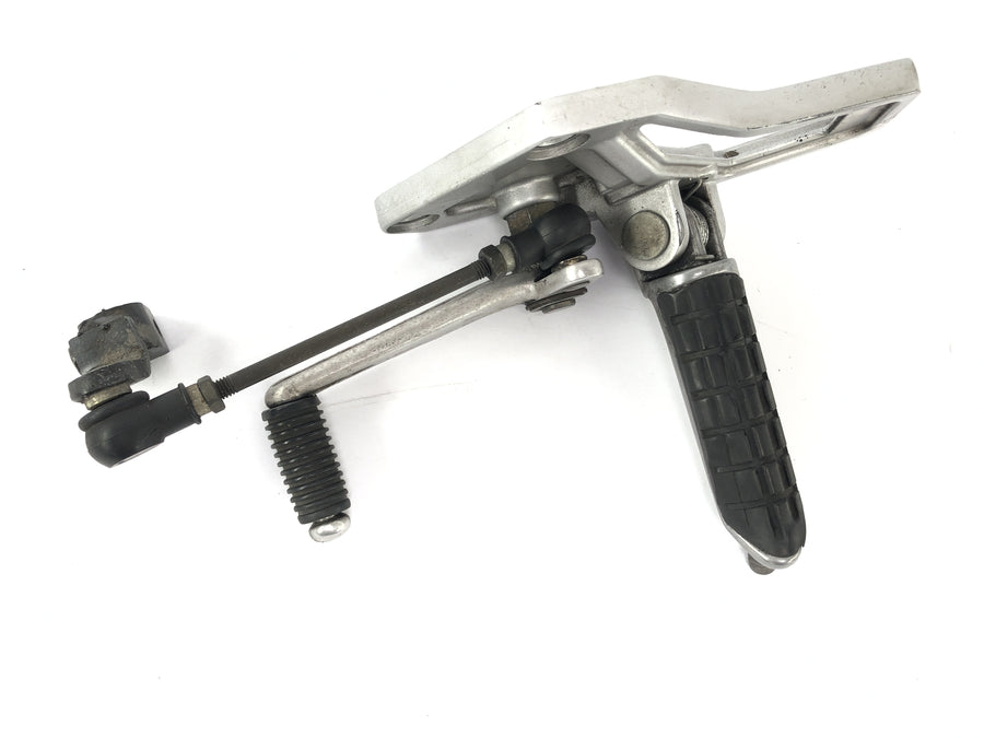 Kawasaki ZX -10 ZXT00B [1990] - footrest system on the left with switching cliffs and switching pedal footrest