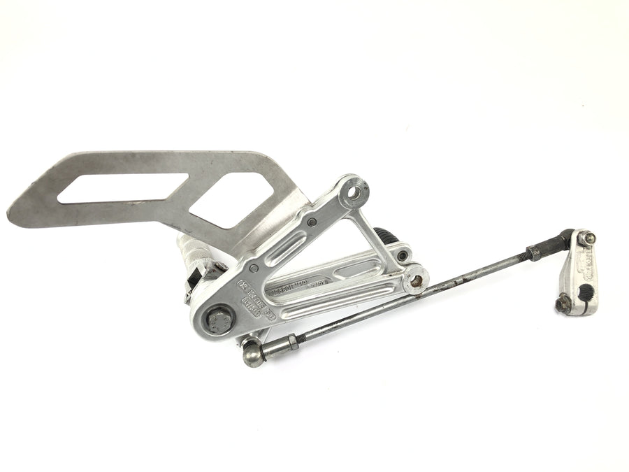 Aprilia SL 1000 Falco Pa [2000] - footrest system driver on the left with switching frames