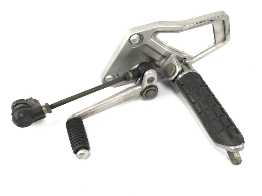 Kawasaki ZX -10 ZXT00B [1990] - footrest system on the left with switching cliffs and switching pedal footrest