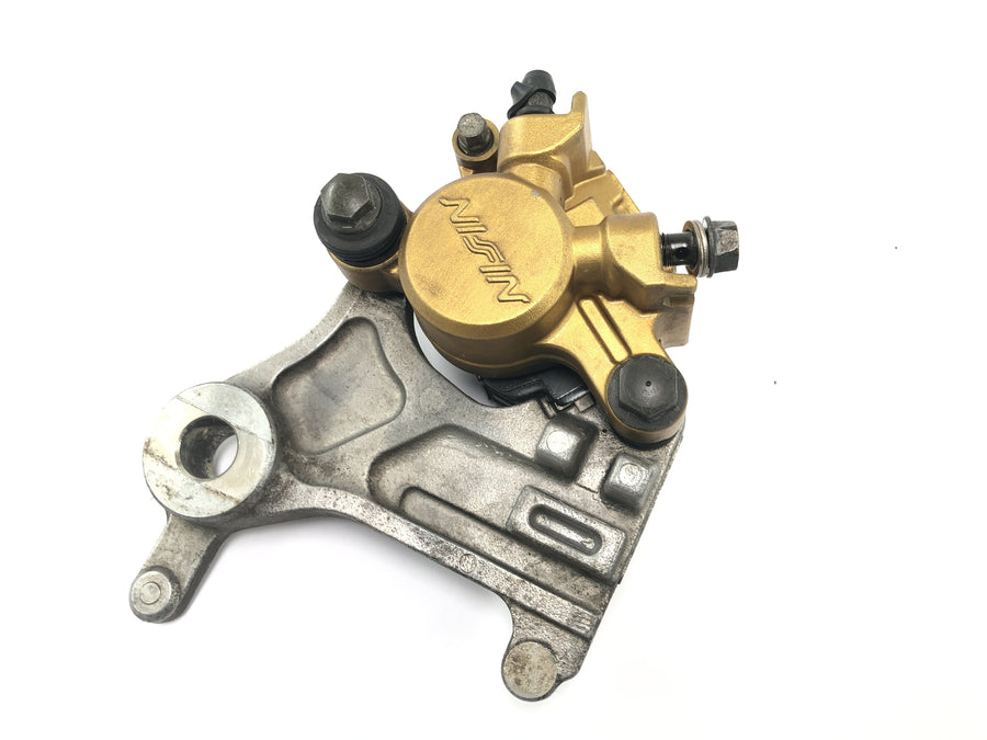 Honda FMX 650 RD12 [2006] - Rear brake caliper Nissin with holder plate
