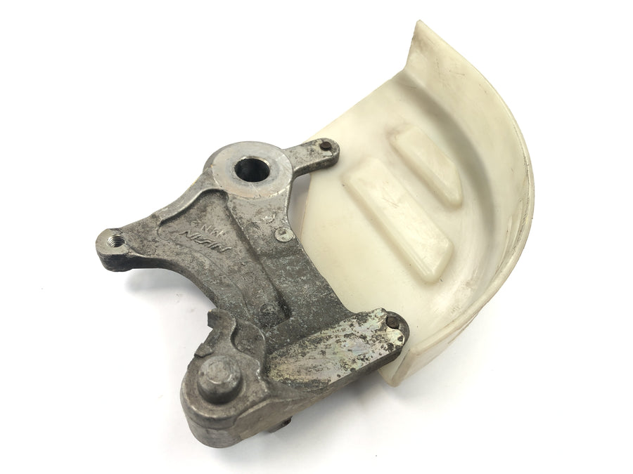 Honda NX 650 RD08 [1995] - brake disc protection cover front hub braking anchor