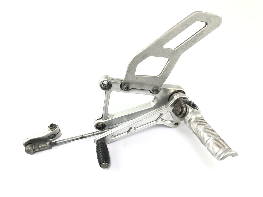 Aprilia SL 1000 Falco Pa [2000] - footrest system driver on the left with switching frames