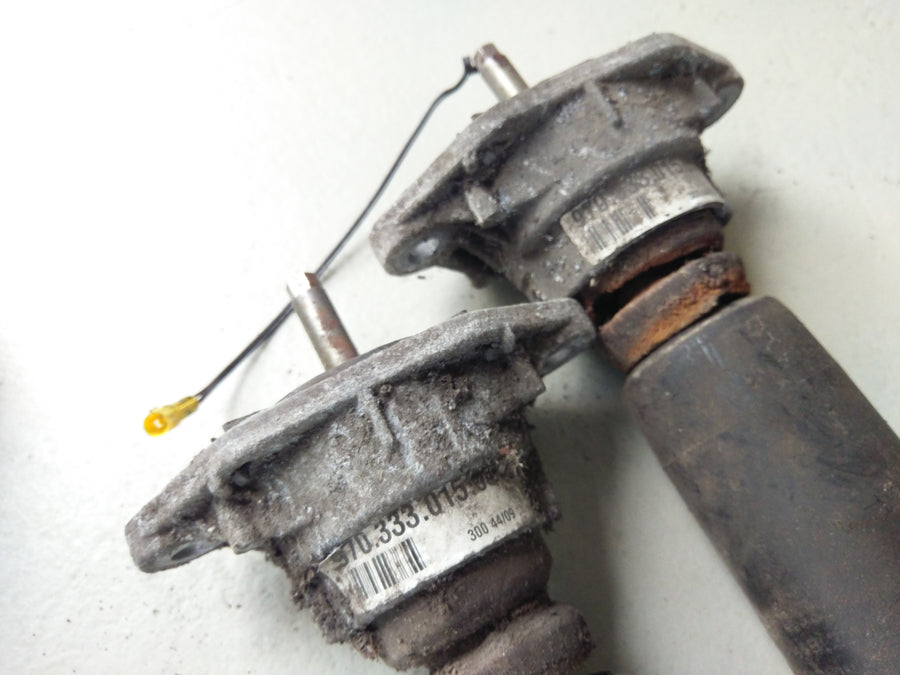 Porsche Panamera Turbo [2010] - Shock absorber air suspension rear 97033316104 and 97033306106