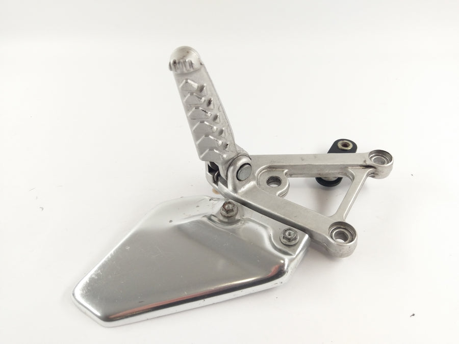 Aprilia RSV 1000 Tuono RP [2005] - Footrest holder and footrest left
